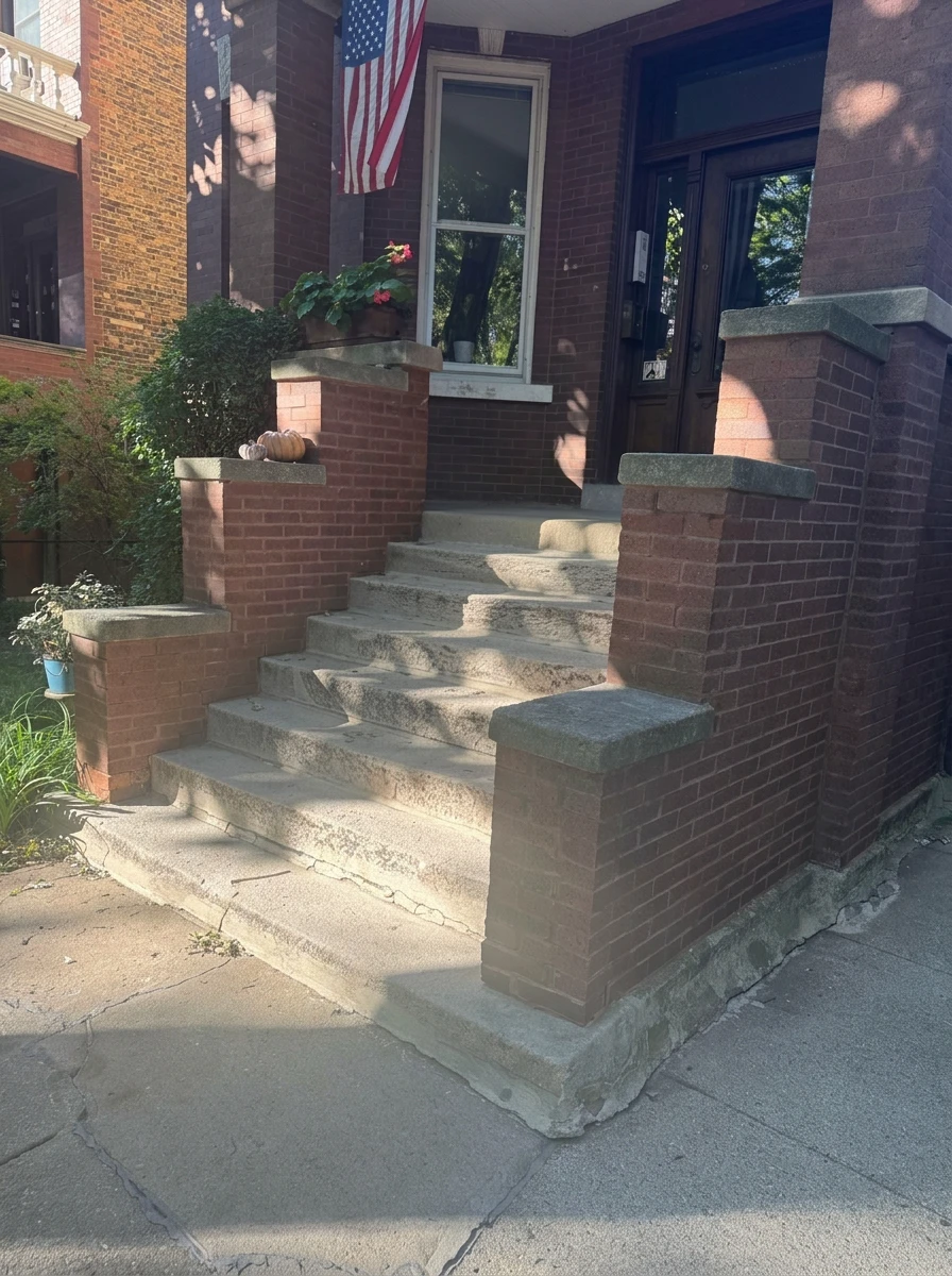 Brick front stoop before rebuild