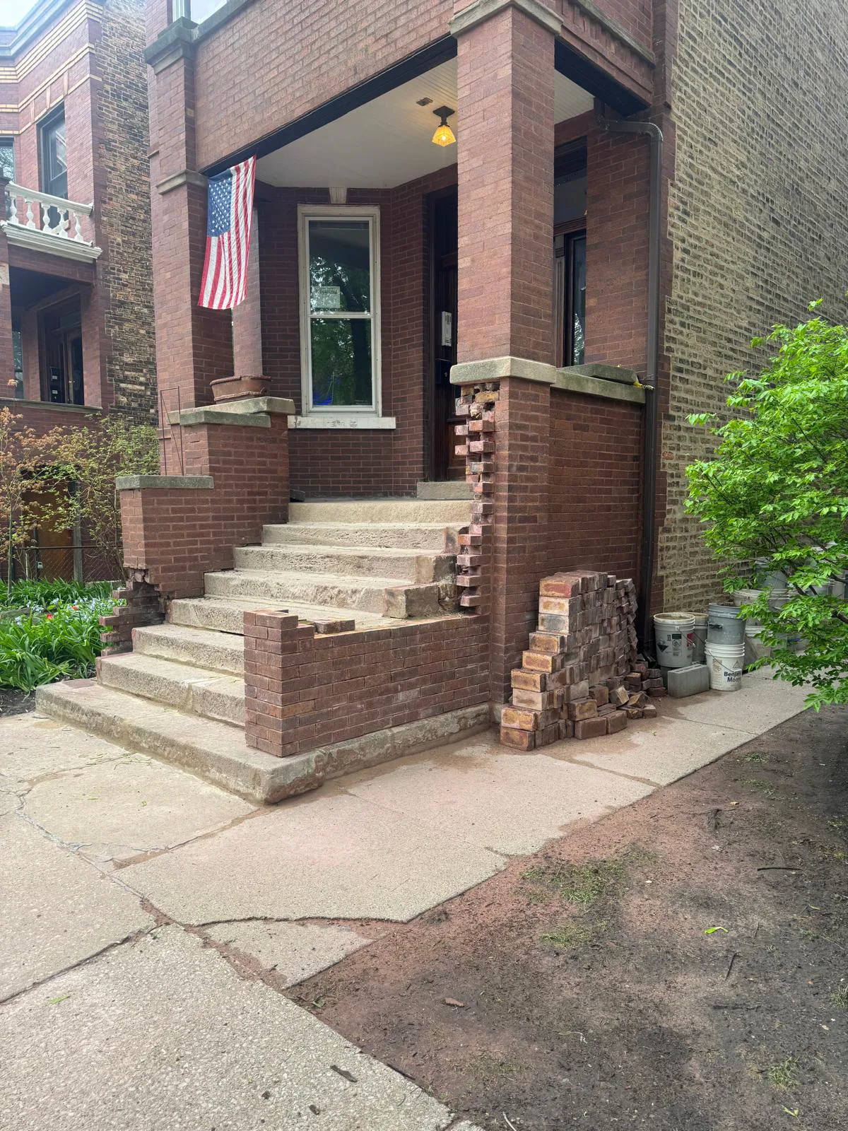 Brick front wingwall rebuild — during