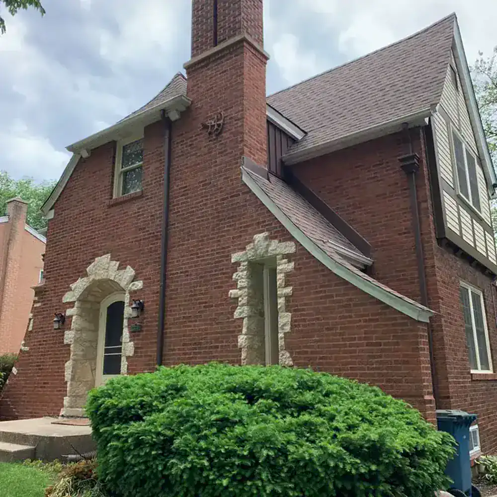 Tudor-style Chicago home with a fully rebuilt, tuckpointed red-brick chimney