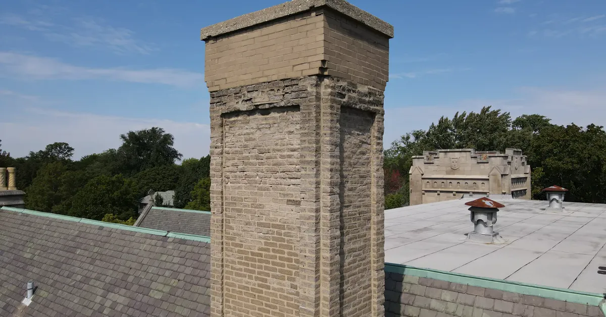 Aerial view of chimney work on a Chicago rooftop