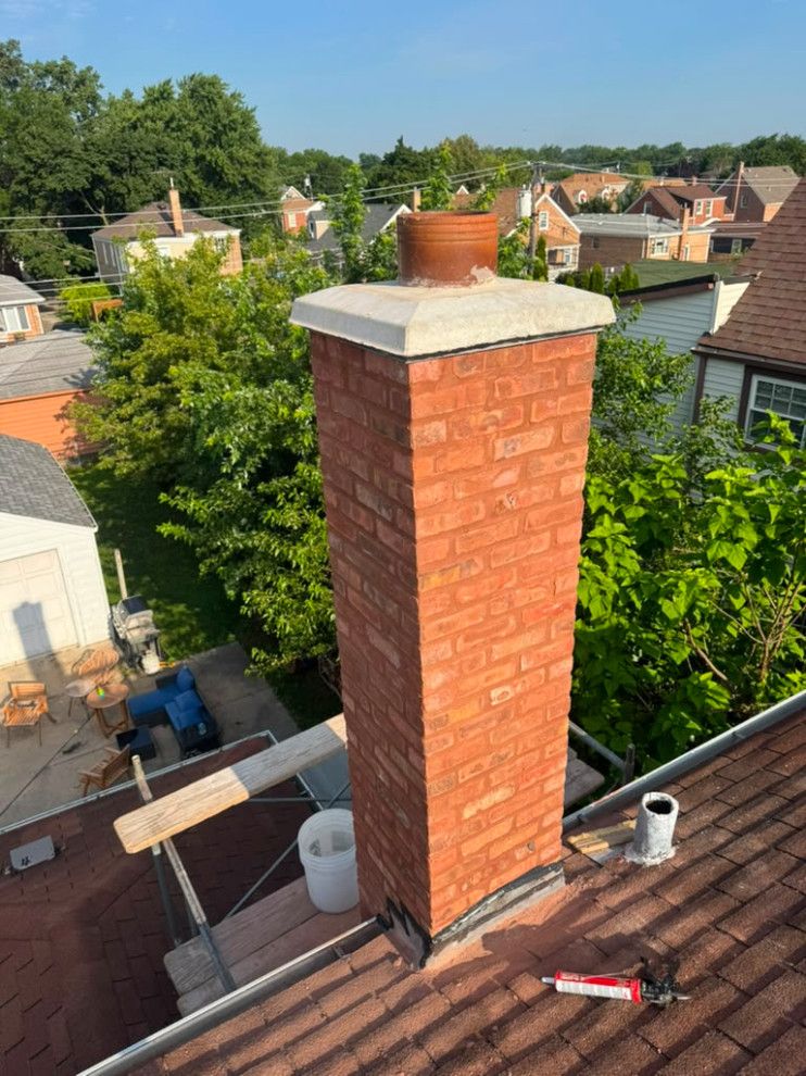 Completed chimney restoration with a new one-piece concrete crown