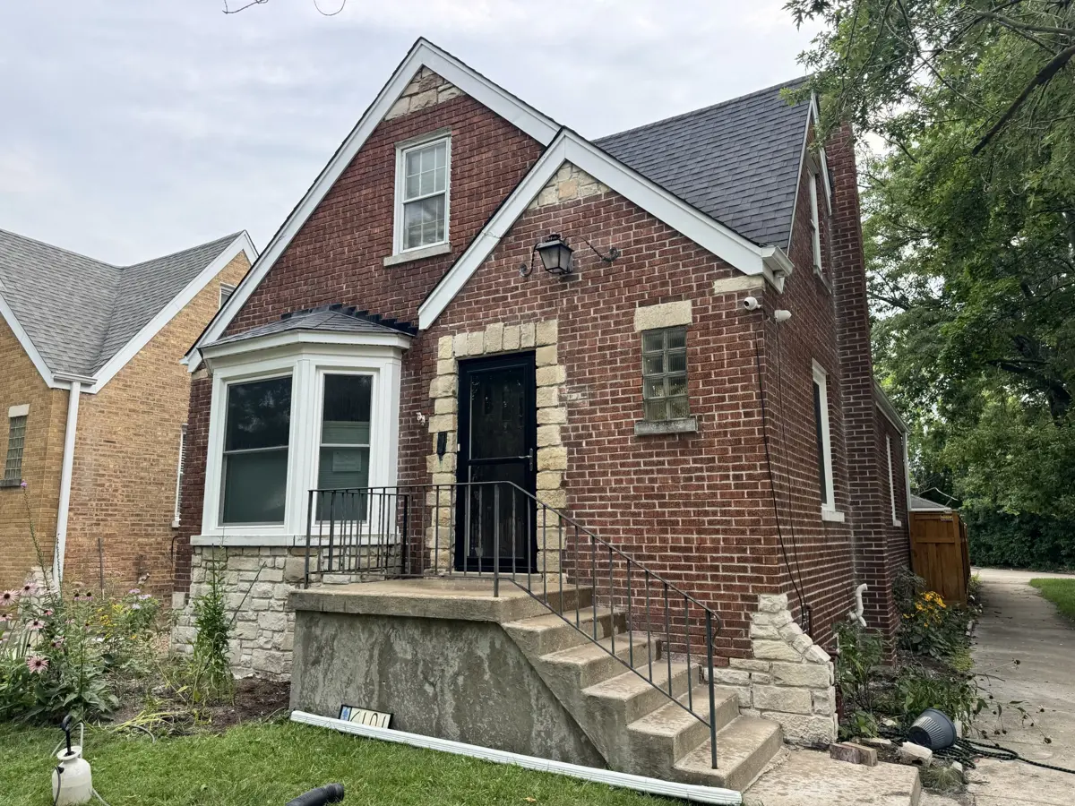 Front and side brick elevations before tuckpointing and mortar color matching