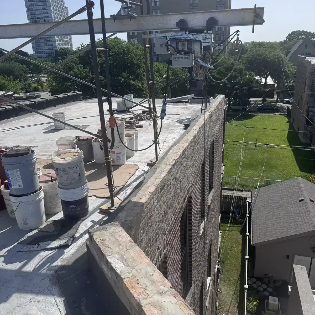 Active grinding and color-matched pointing on a Chicago parapet wall