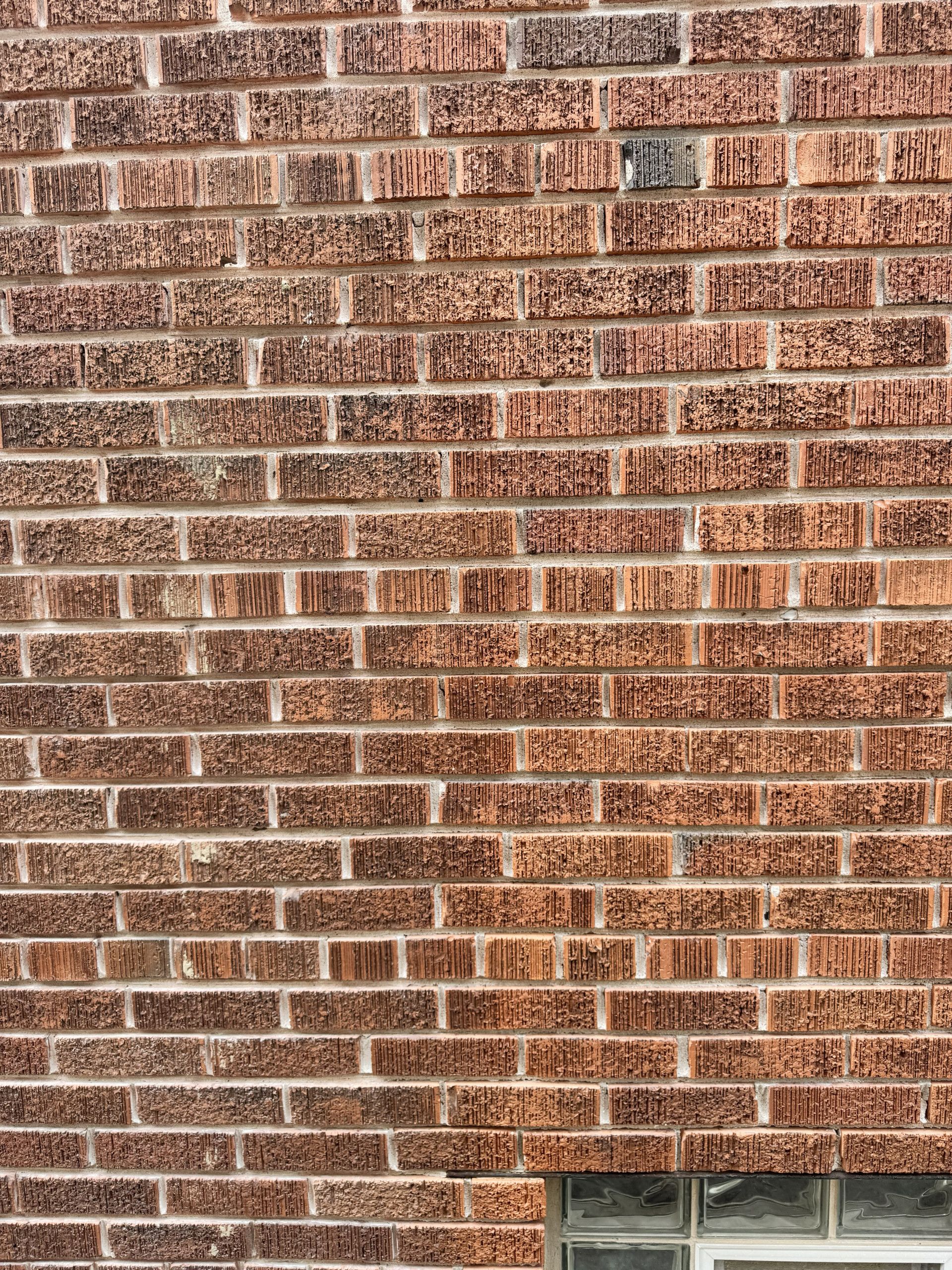 Close detail of deteriorated mortar joints before restoration