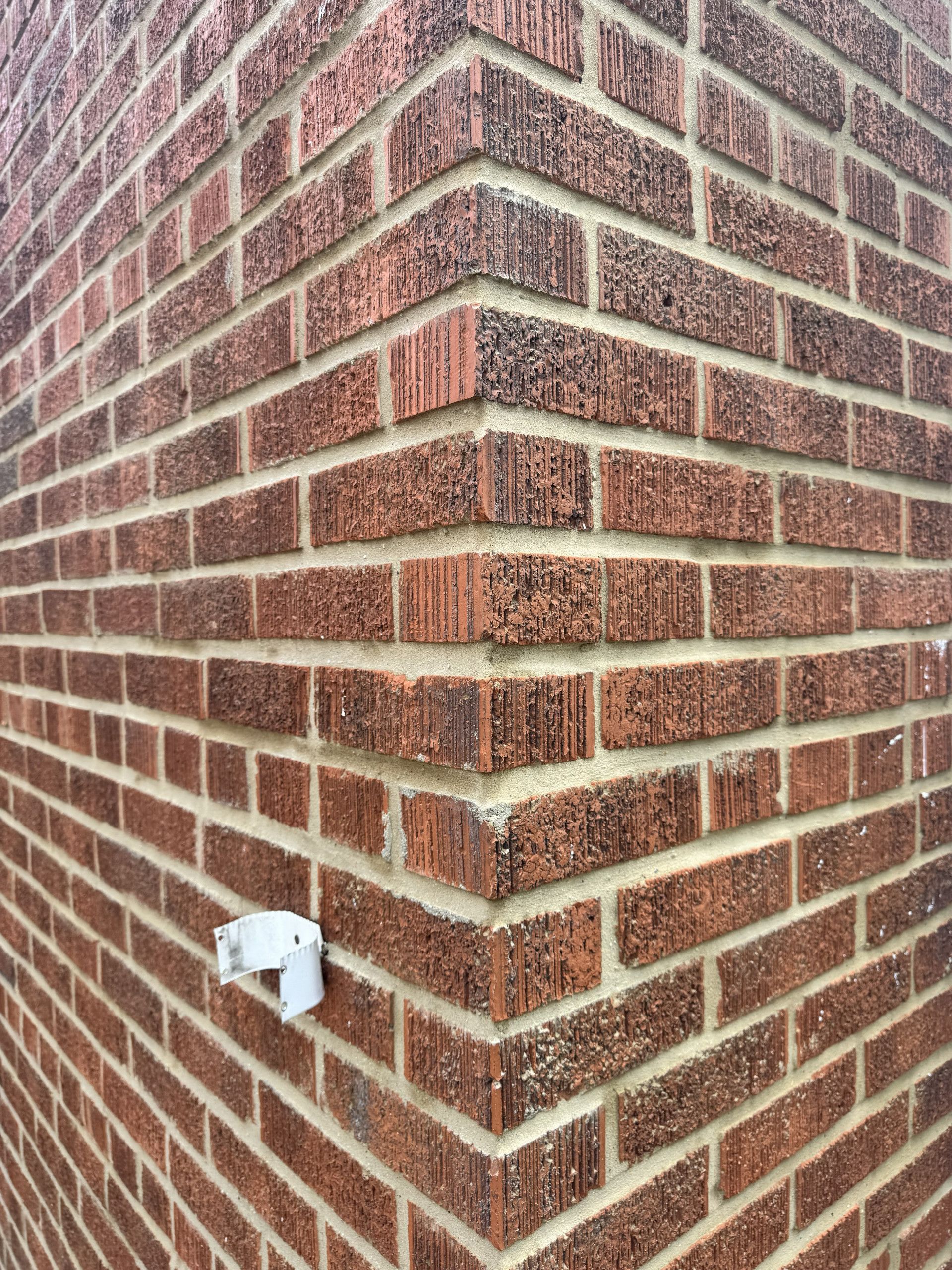 Brick wall detail showing mortar joints during the restoration project