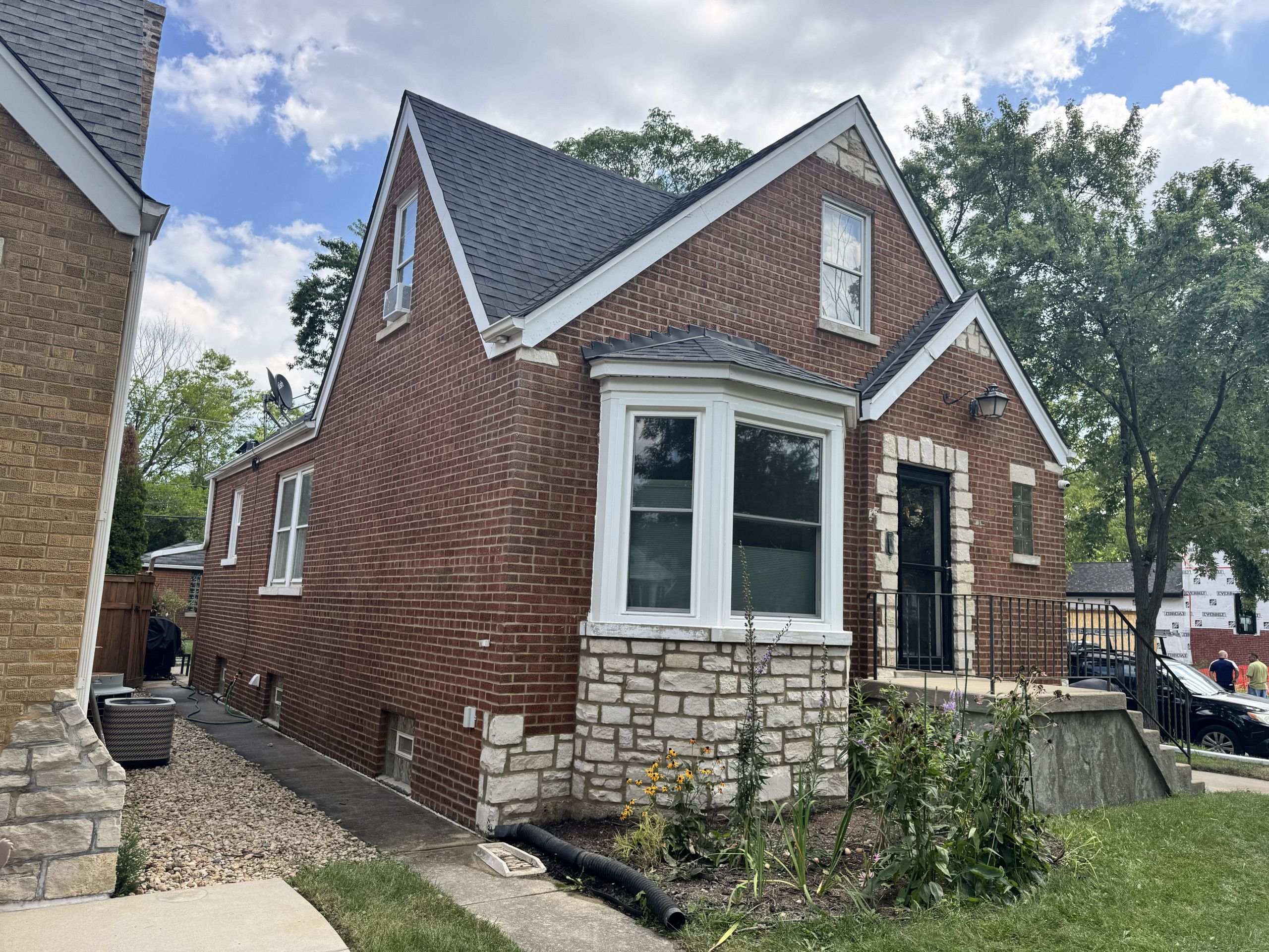 Brick exterior after tuckpointing and mortar color matching