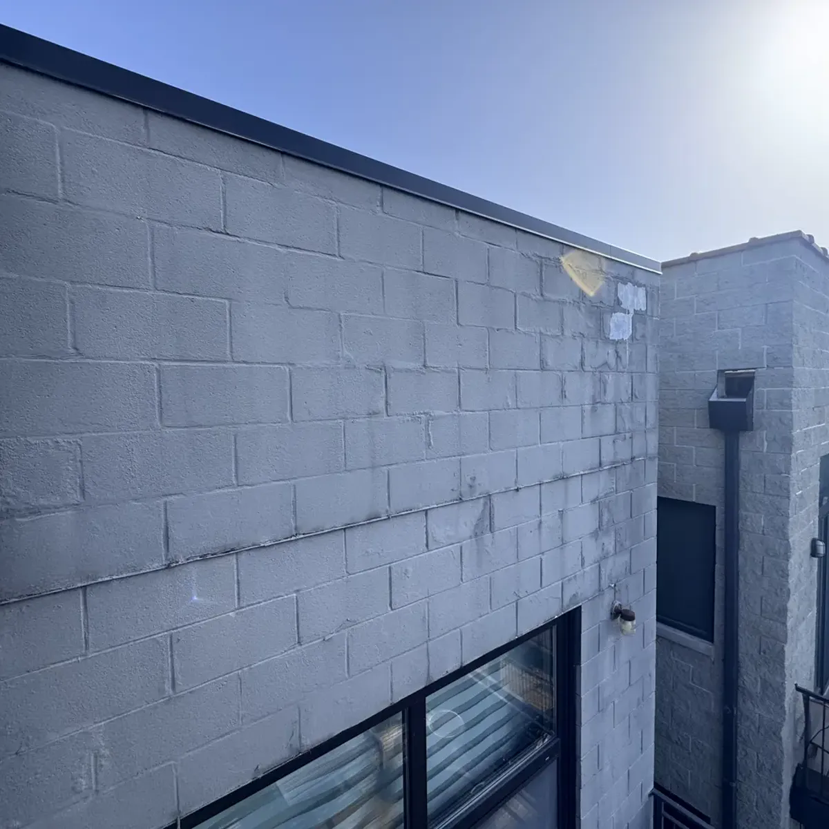 Cinder block wall on a Chicago multi-story building before waterproofing — Star Tuckpointing